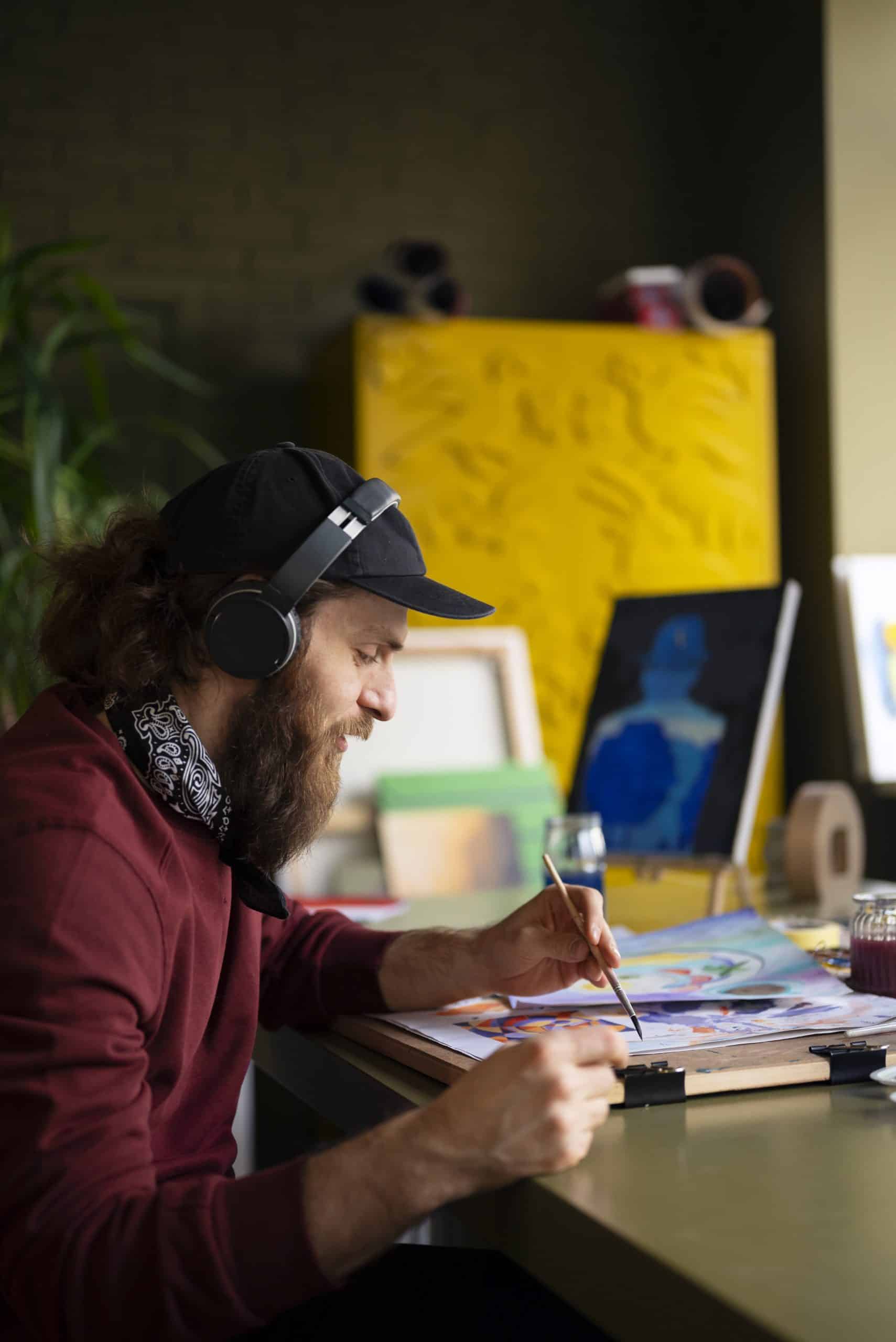 Creative professional painting in art studio | Trident Media Management inspiration